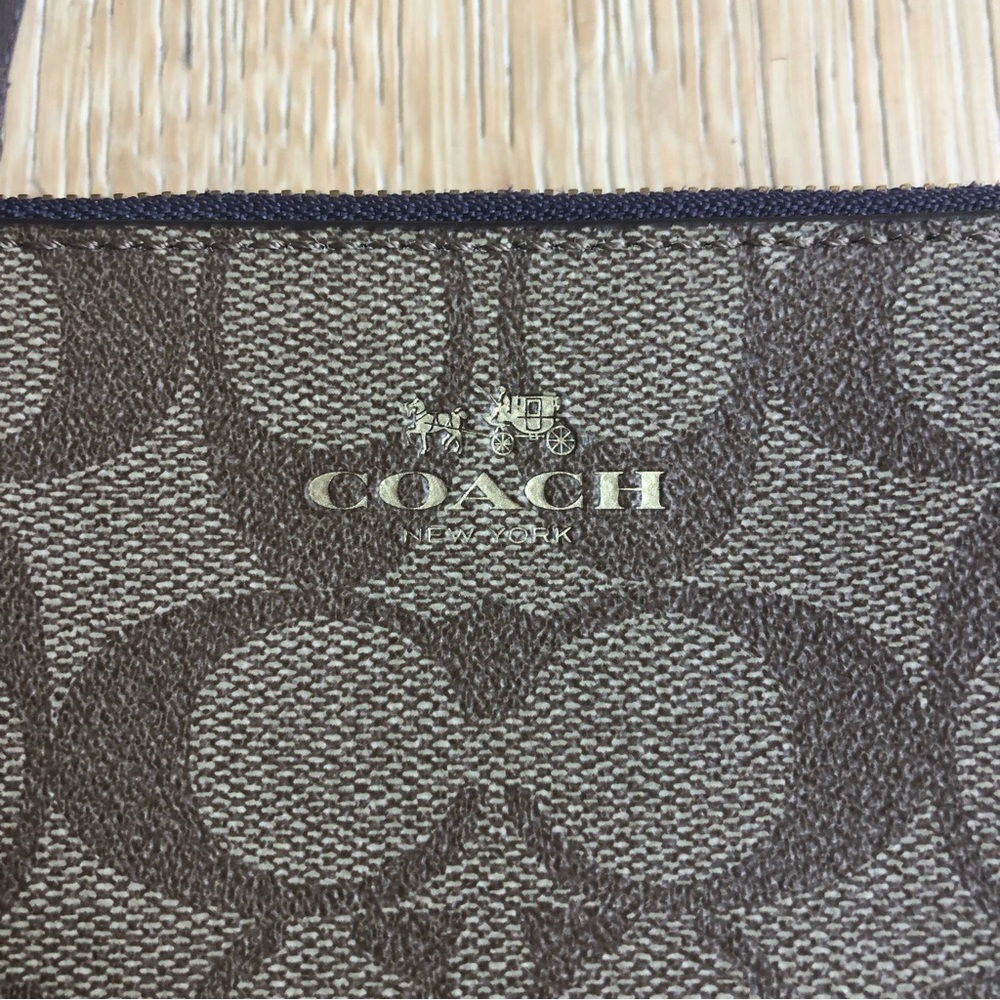 🔥Coach double zip wristlet price firm!